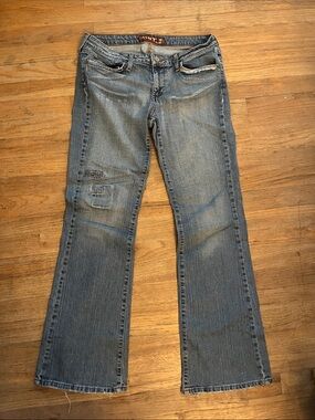 Rivet & Thread Light Blue Flare Jeans with Subtle Distressing